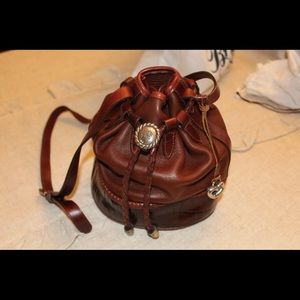 Brown leather drawstring tote
